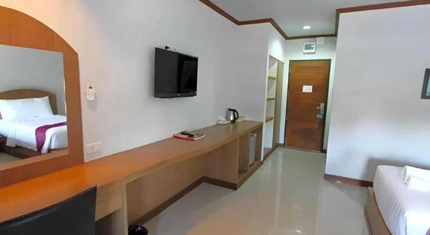 Bed in Thada Chateau Hotel