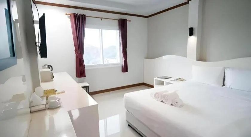 Bed in Thada Chateau Hotel