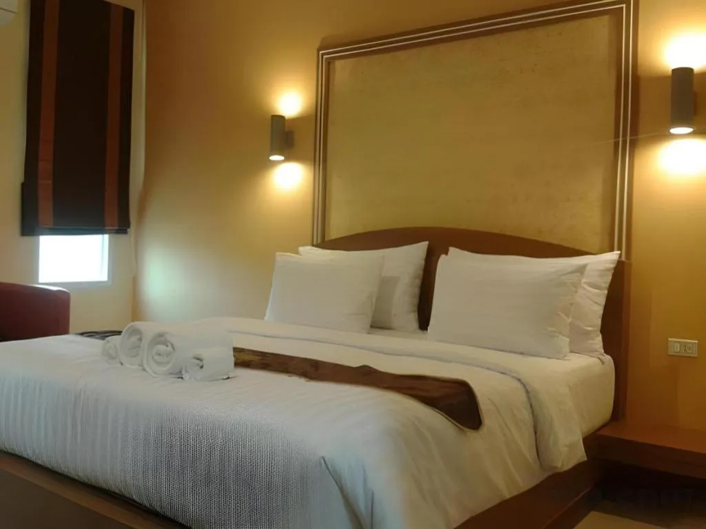 Bed in Thada Chateau Hotel