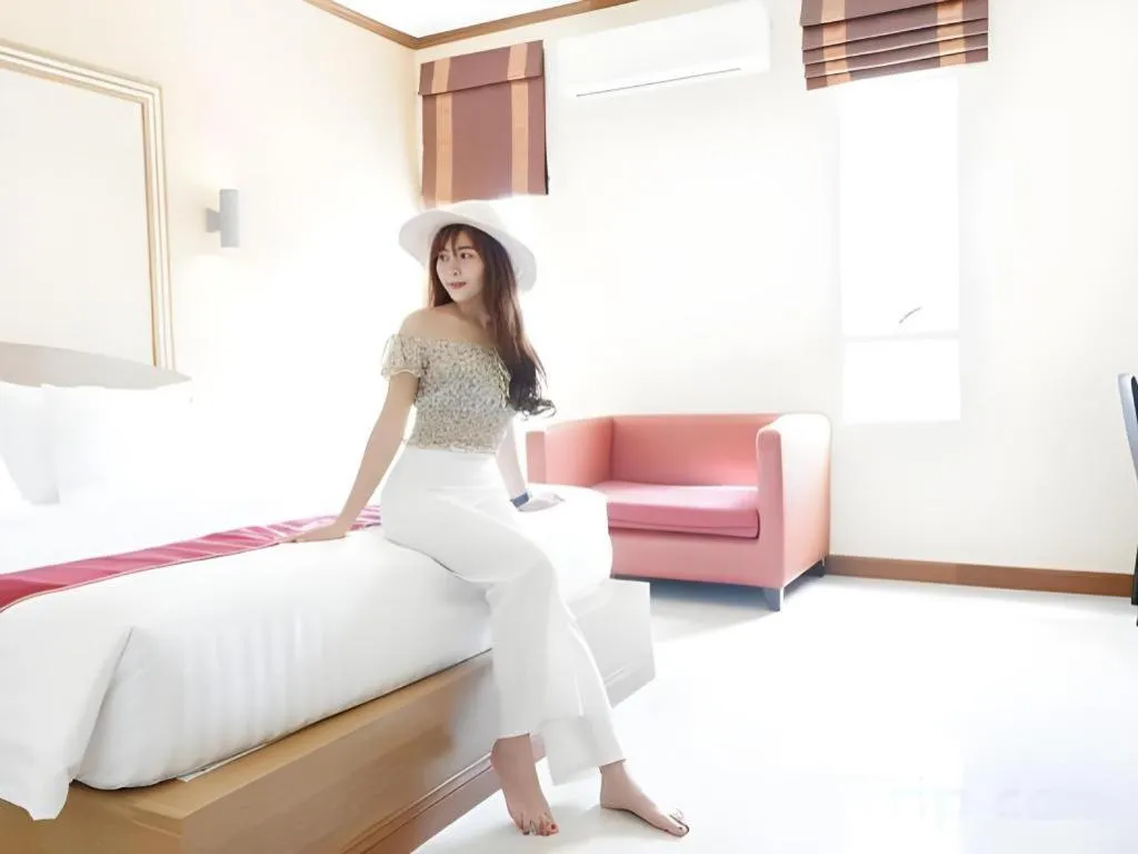 Bed in Thada Chateau Hotel