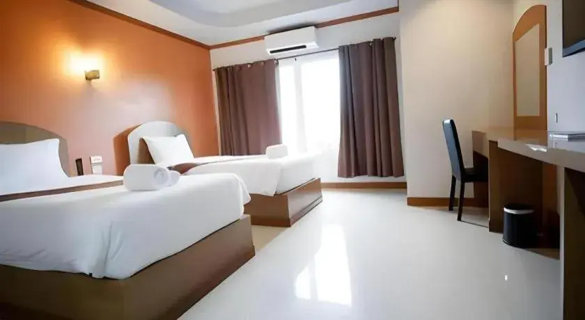 Bed in Thada Chateau Hotel Bed in Thada Chateau Hotel