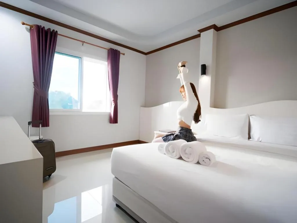 Bed in Thada Chateau Hotel