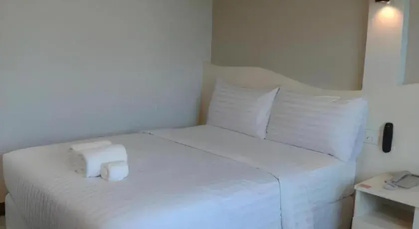 Bed in Thada Chateau Hotel Bed in Thada Chateau Hotel