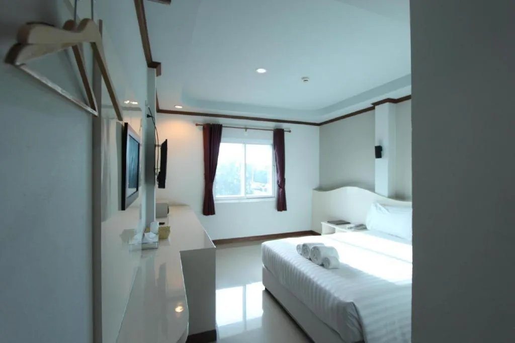 Bed in Thada Chateau Hotel