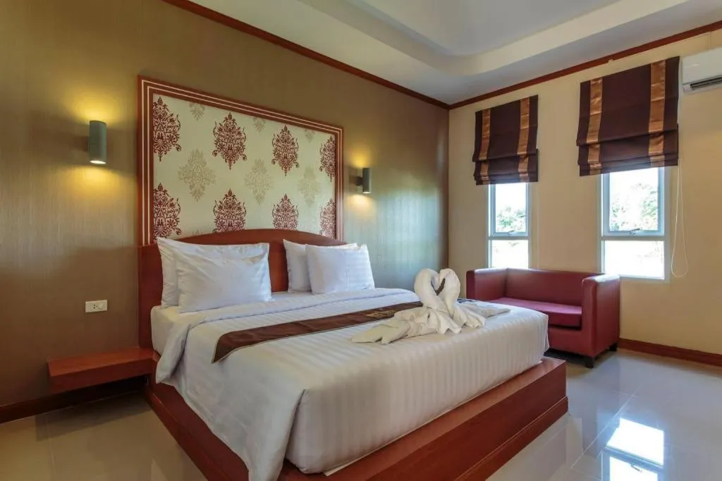 Bed in Thada Chateau Hotel