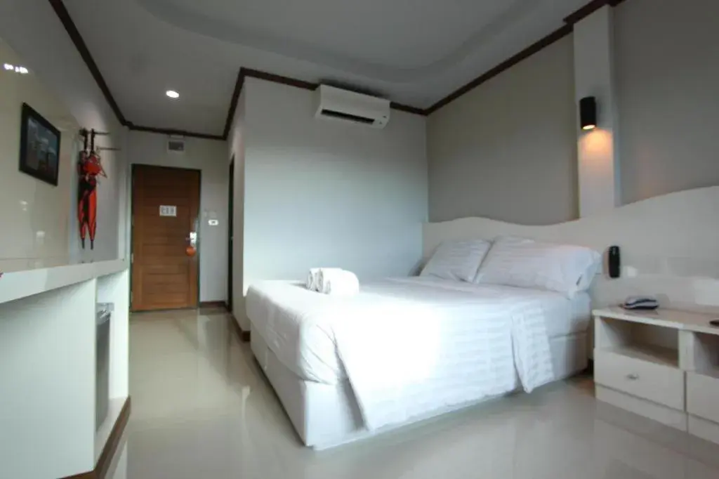 Bed in Thada Chateau Hotel Bed in Thada Chateau Hotel