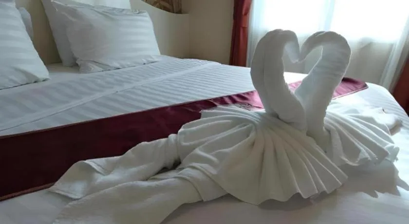 Bed in Thada Chateau Hotel