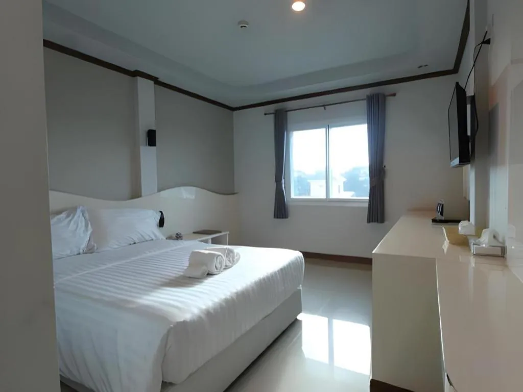 Bed in Thada Chateau Hotel