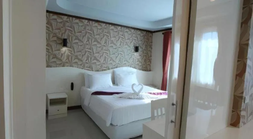 Bed in Thada Chateau Hotel