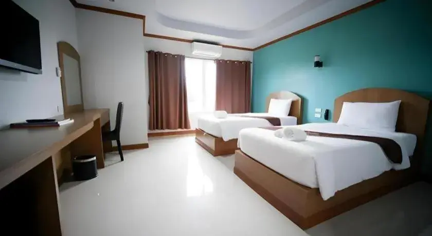 Bed in Thada Chateau Hotel Bed in Thada Chateau Hotel