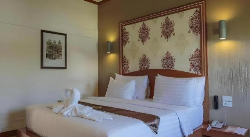 Bed in Thada Chateau Hotel