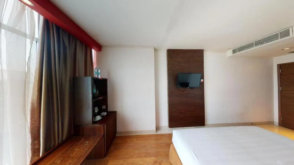 Bed in Redstar Hotel Jakarta