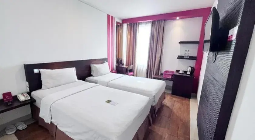 Bed in Redstar Hotel Jakarta Bed in Redstar Hotel Jakarta