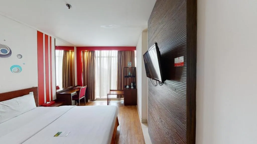 Bed in Redstar Hotel Jakarta