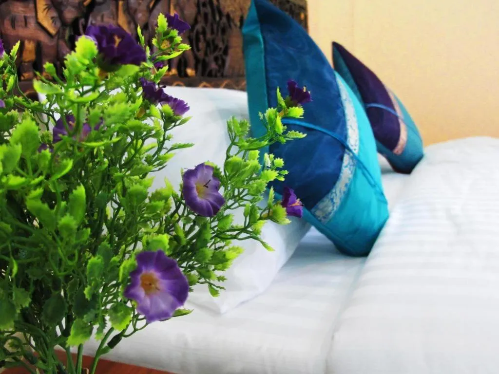 Bed in Baan Maesot Boutique Resort