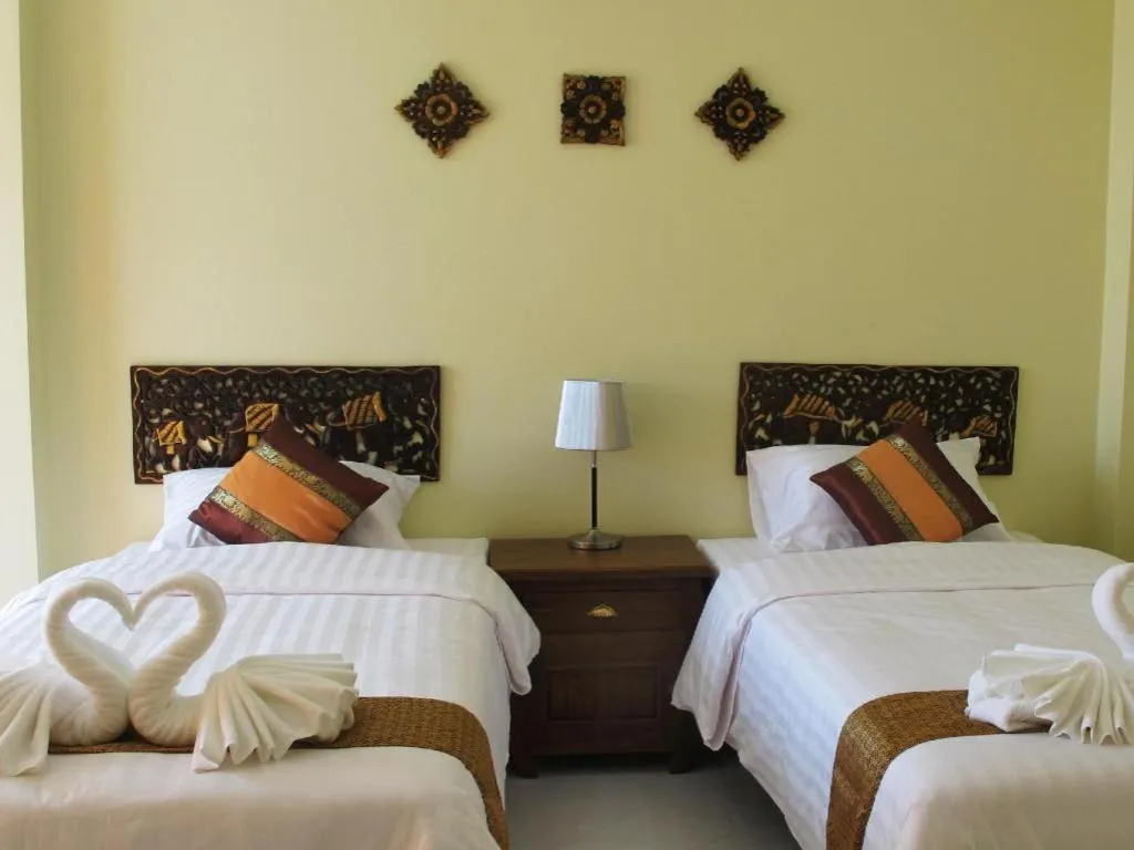 Bed in Baan Maesot Boutique Resort