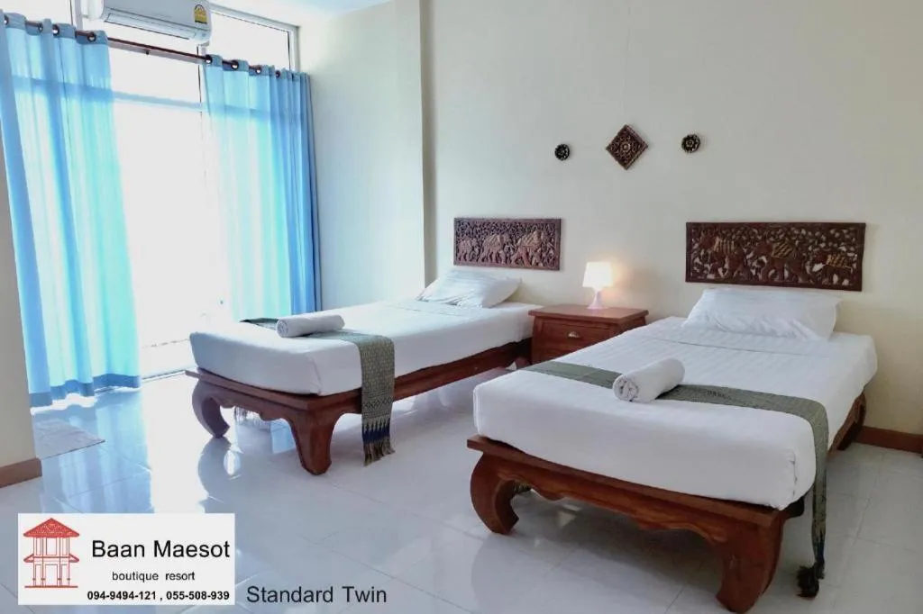 Bed in Baan Maesot Boutique Resort