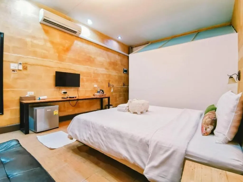 Bed in Villa Tuscany Country Resort