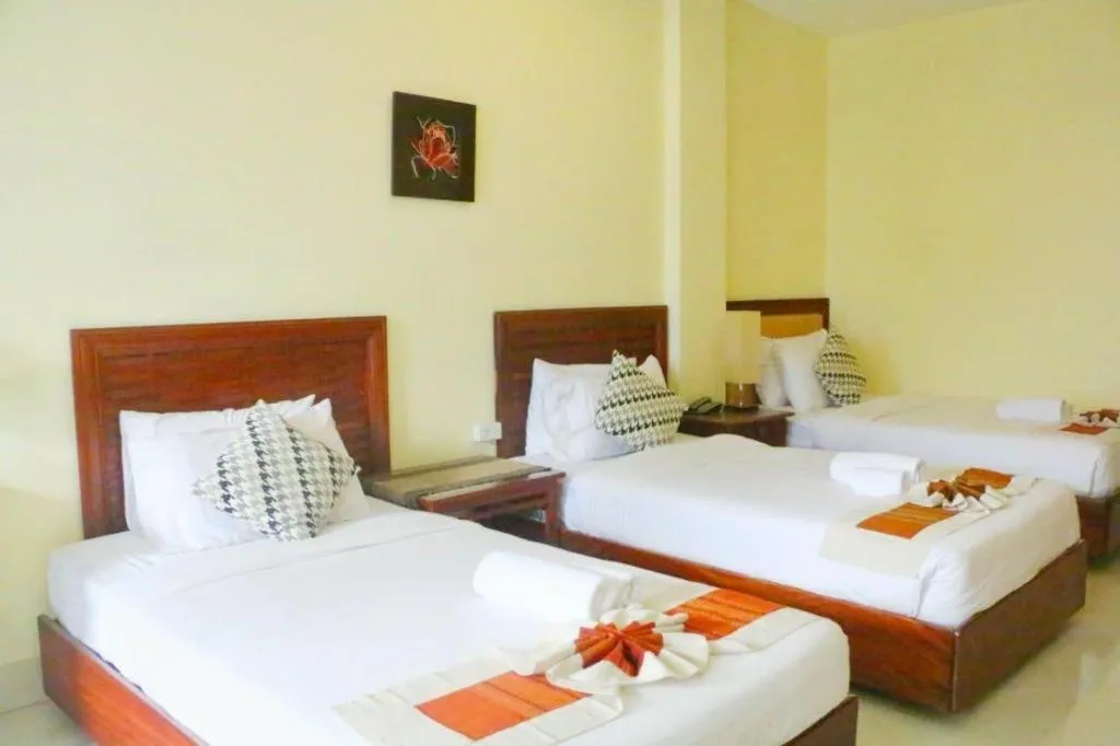 Bed in New Rose Boutique Hotel