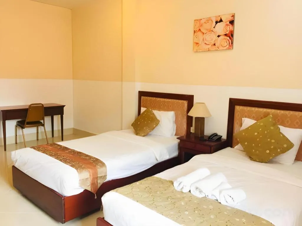 Bed in New Rose Boutique Hotel