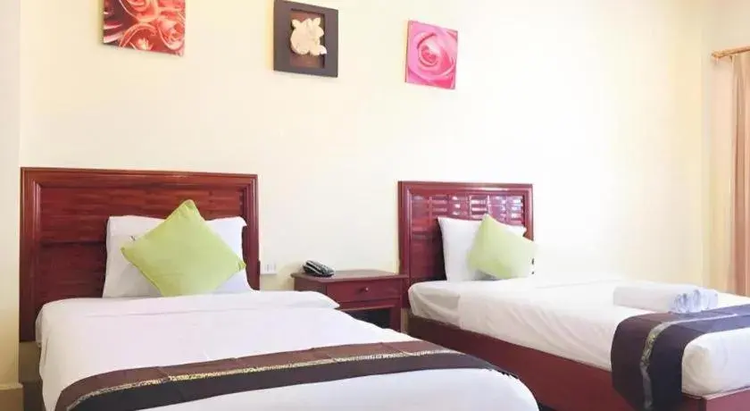 Bed in New Rose Boutique Hotel Bed in New Rose Boutique Hotel