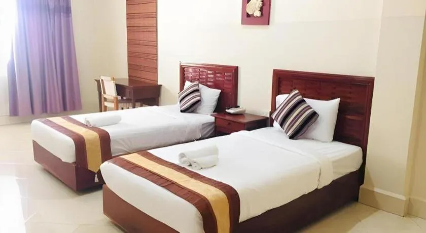 Bed in New Rose Boutique Hotel