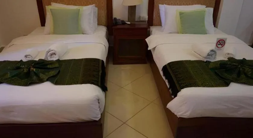 Bed in New Rose Boutique Hotel