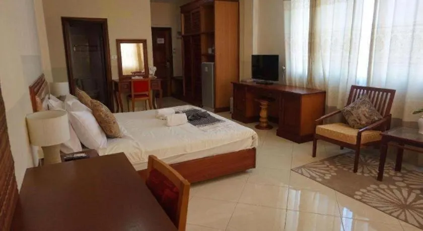 Bed in New Rose Boutique Hotel