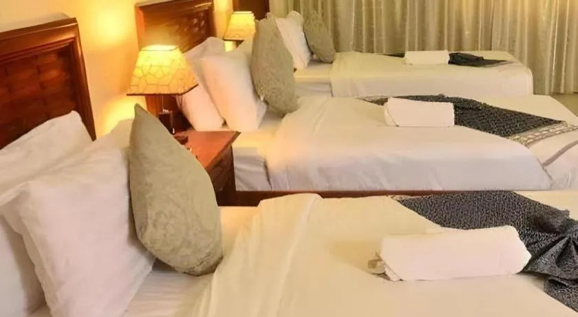 Bed in New Rose Boutique Hotel