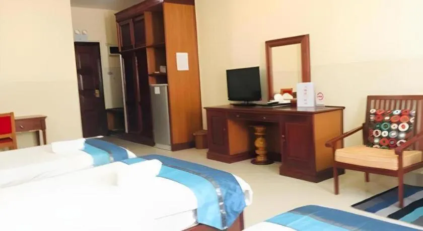 Bed in New Rose Boutique Hotel