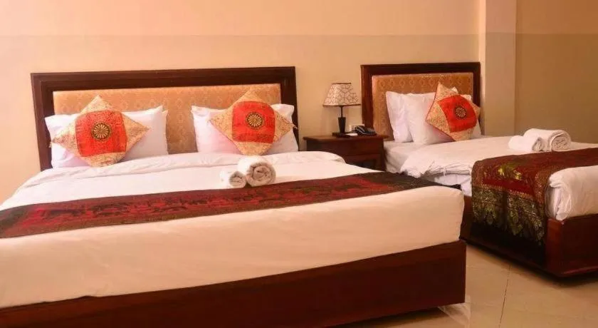 Bed in New Rose Boutique Hotel