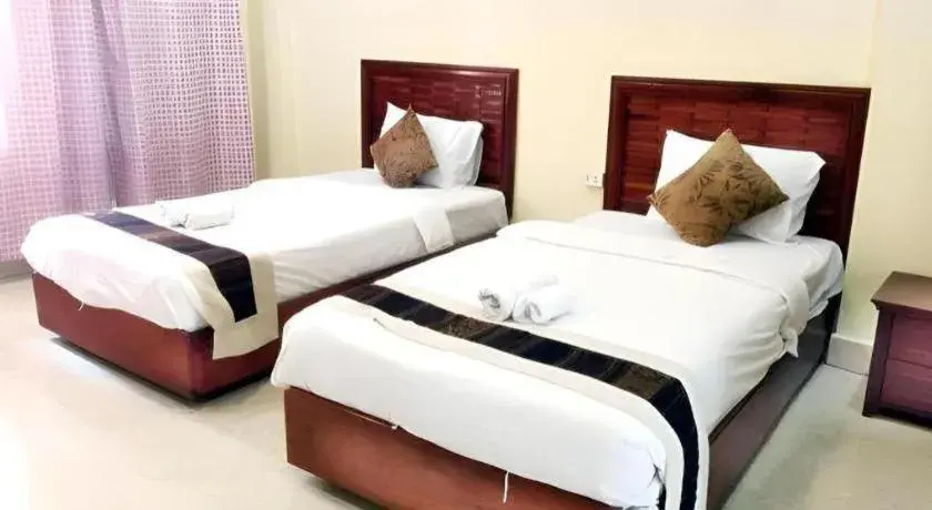 Bed in New Rose Boutique Hotel Bed in New Rose Boutique Hotel