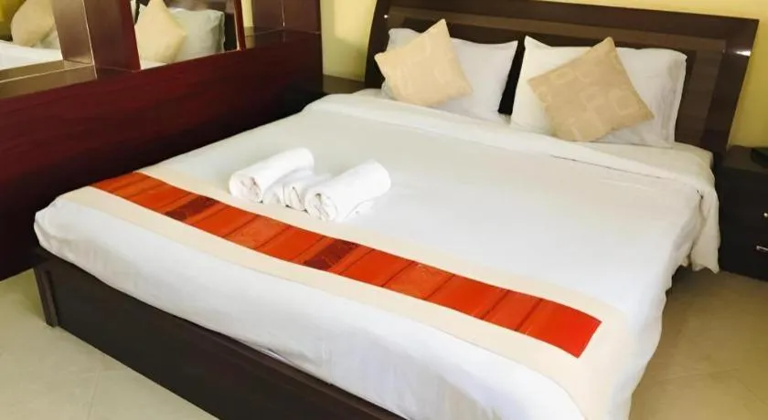 Bed in New Rose Boutique Hotel