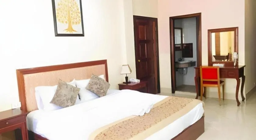 Bed in New Rose Boutique Hotel