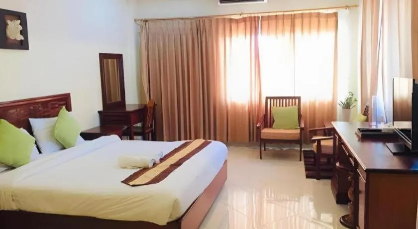 Bed in New Rose Boutique Hotel