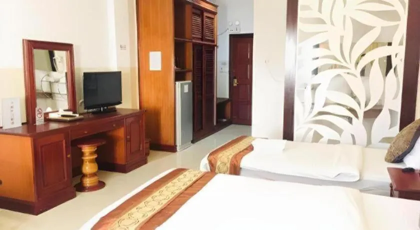 Bed in New Rose Boutique Hotel