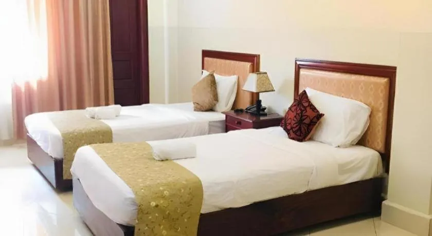 Bed in New Rose Boutique Hotel