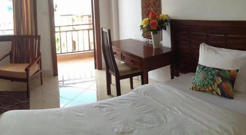 Bed in New Rose Boutique Hotel