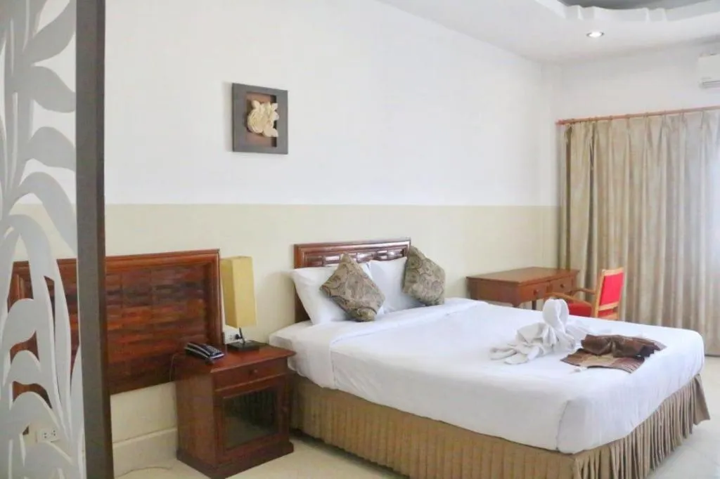 Bed in New Rose Boutique Hotel