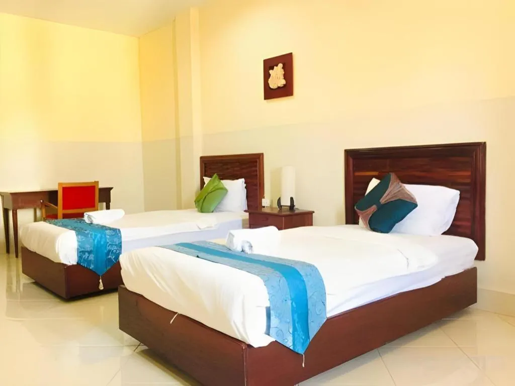 Bed in New Rose Boutique Hotel