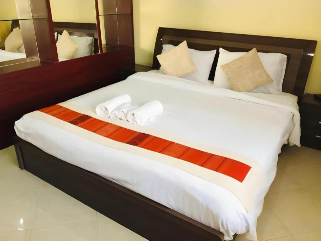 Bed in New Rose Boutique Hotel