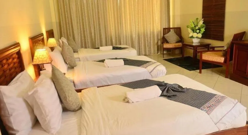 Bed in New Rose Boutique Hotel