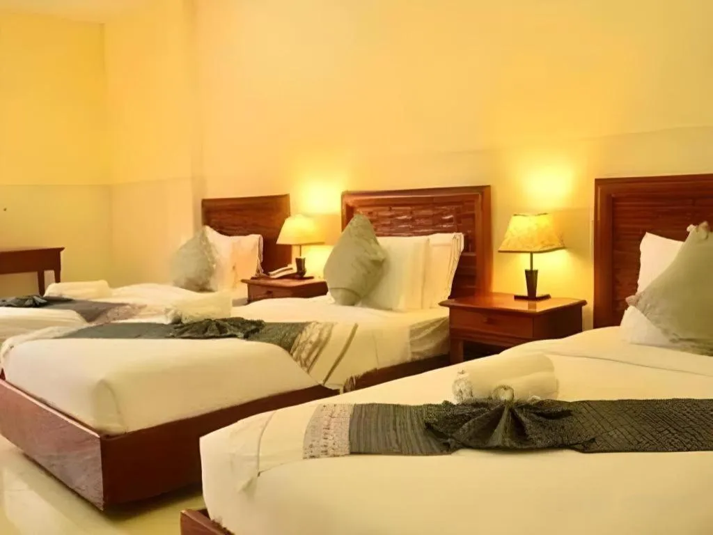 Bed in New Rose Boutique Hotel