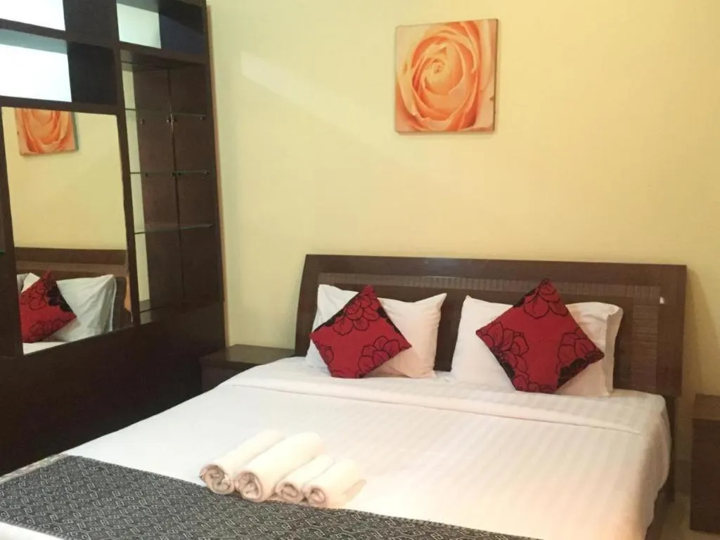 Bed in New Rose Boutique Hotel