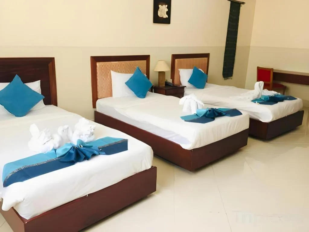 Bed in New Rose Boutique Hotel