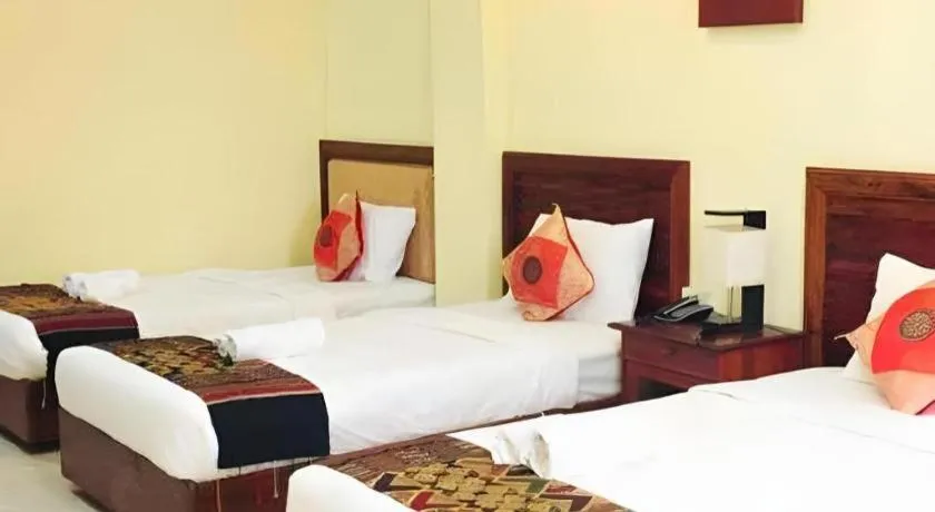 Bed in New Rose Boutique Hotel