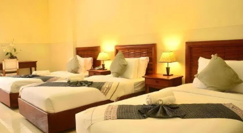 Bed in New Rose Boutique Hotel