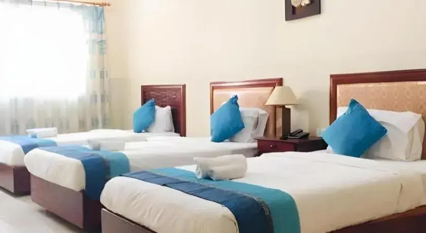 Bed in New Rose Boutique Hotel Bed in New Rose Boutique Hotel