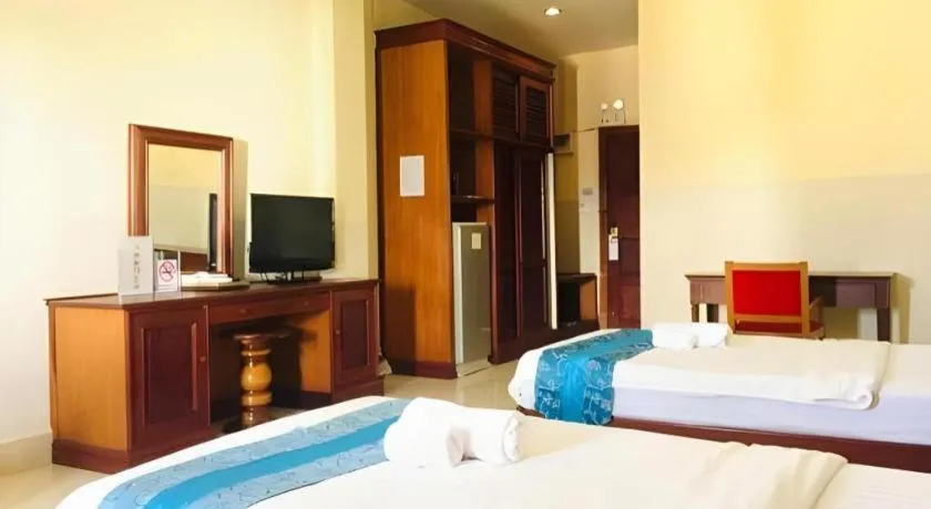 Bed in New Rose Boutique Hotel