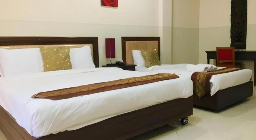 Bed in New Rose Boutique Hotel